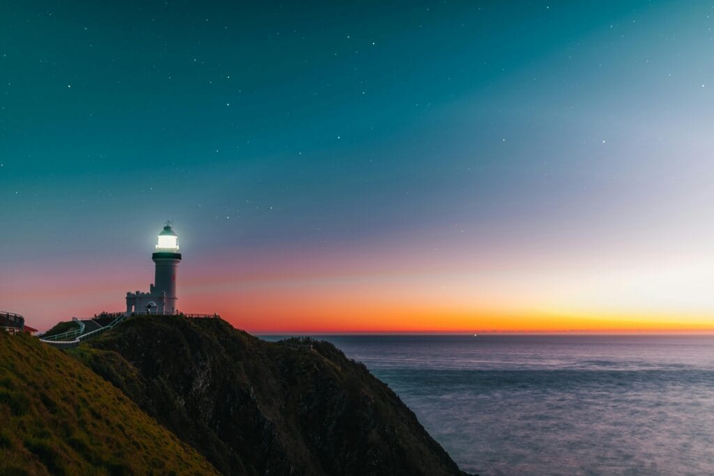 Lighthouse symbolizing leadership role in providing guidance and direction during stormy weather.