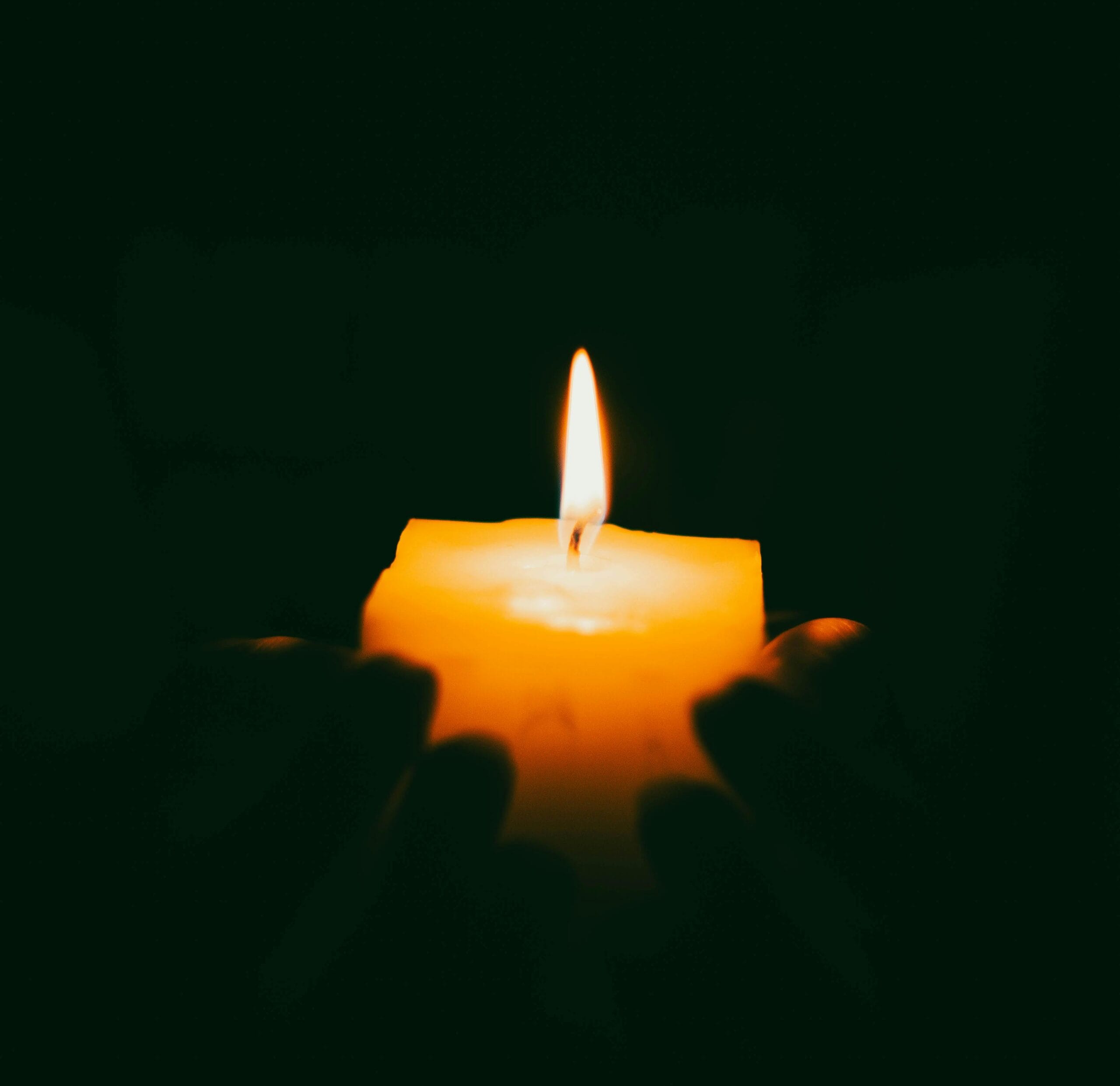 Agency element: burning candle embodying inner strength and confidence to act